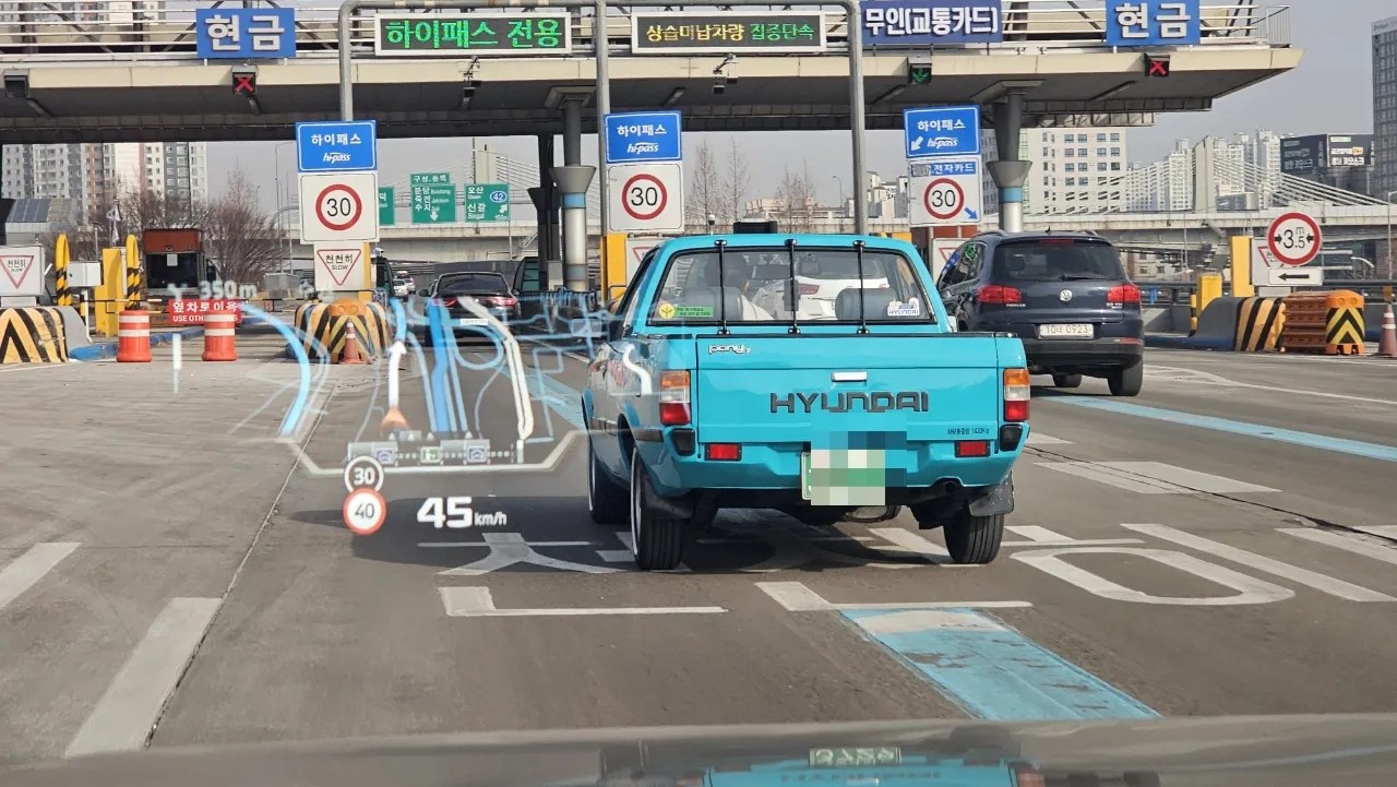 텍스트, 차량, 도로, 육상 차량이(가) 표시된 사진

자동 생성된 설명