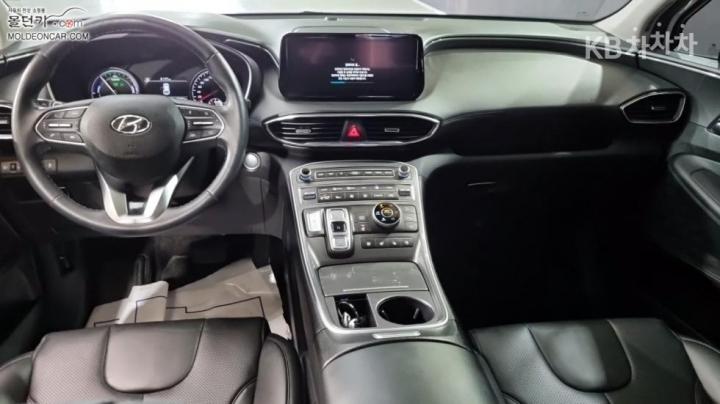 Hyundai Santa Fe TM Hybrid 1.6 HEV 4WD Exclusive 8