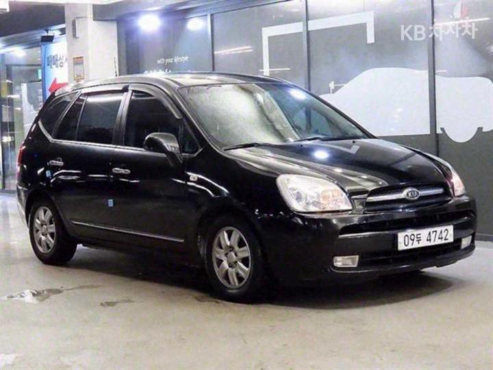 Kia Carens 2.0 lpi gx  luxury — foto 1