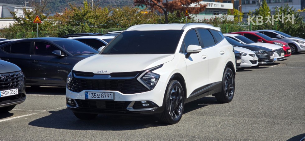 Kia Sportage SIGNATURE — фото 1