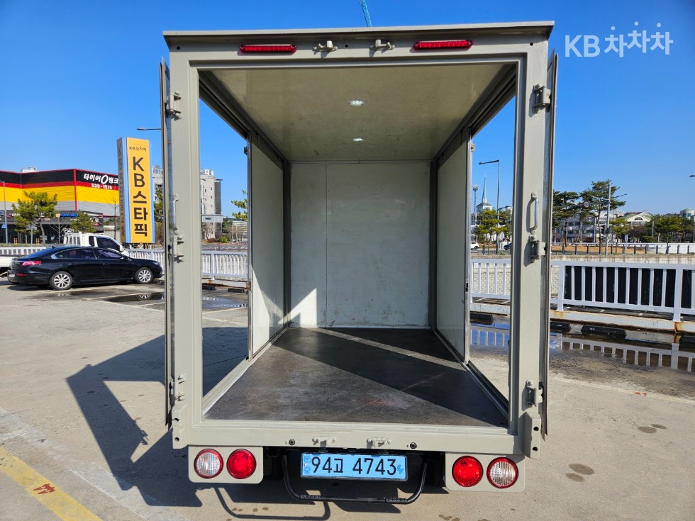 Kia 더 뉴 봉고3 EV 양문형 미닫이탑차 하이 킹캡 초장축 - фото 1