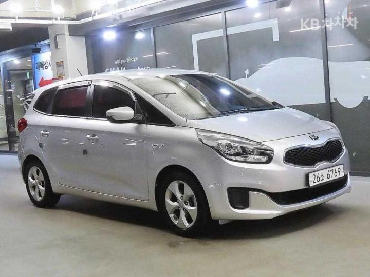 Kia Carens 2.0 lpi  luxury 7  seats — foto 1