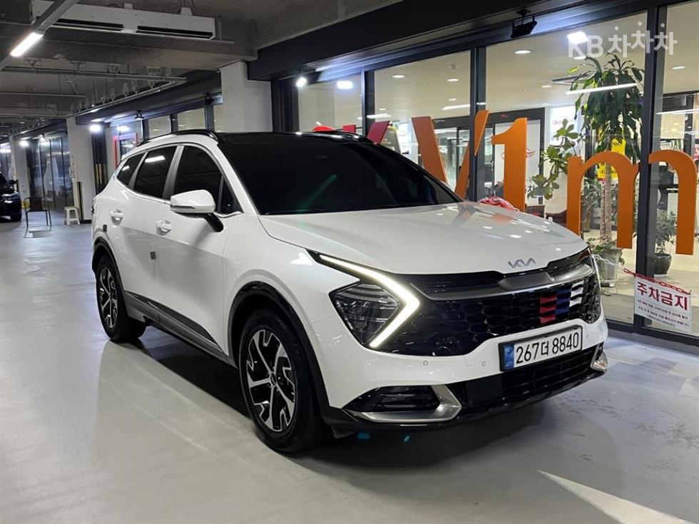 Kia Sportage SIGNATURE — фото 1
