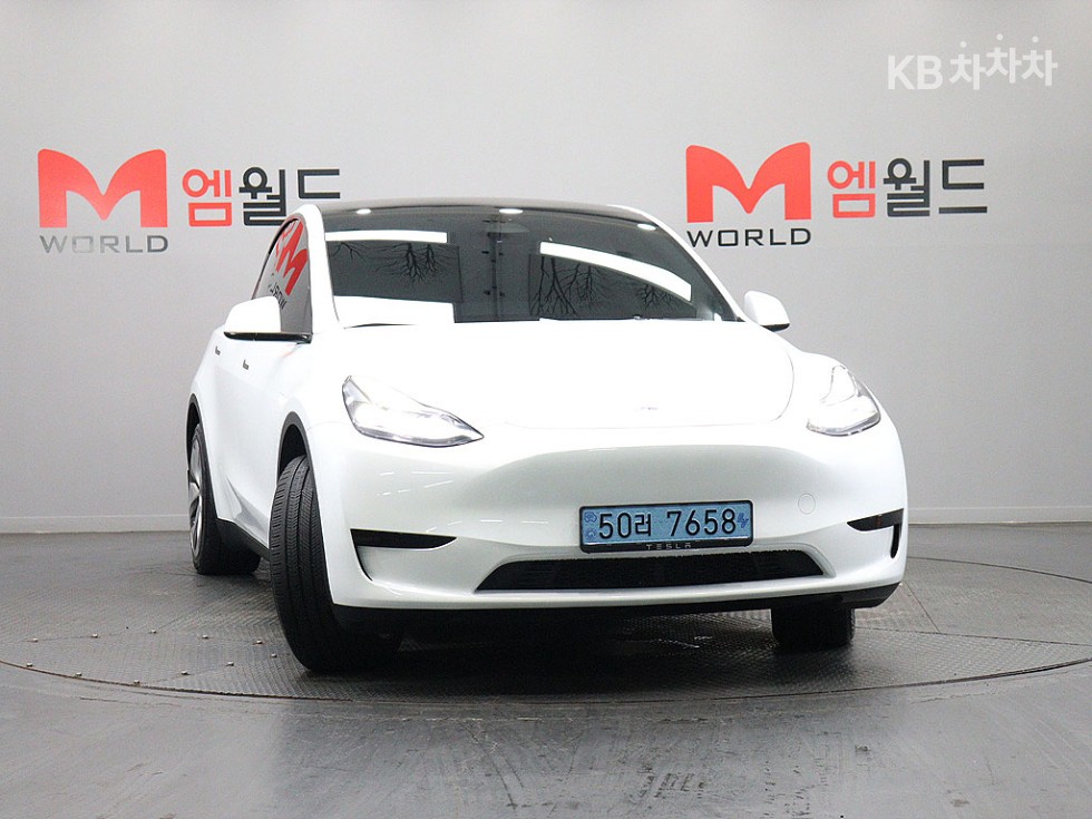 Tesla Model Y BASE MODEL — фото 2
