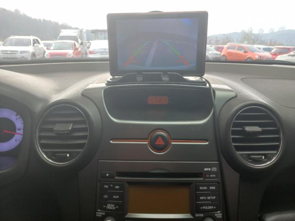 Kia Carens — miniaturë 16