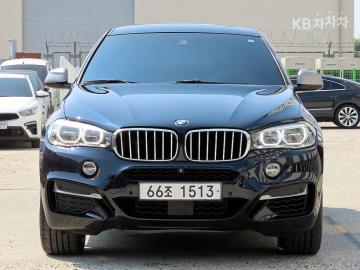 BMW X6 M50d — foto 1