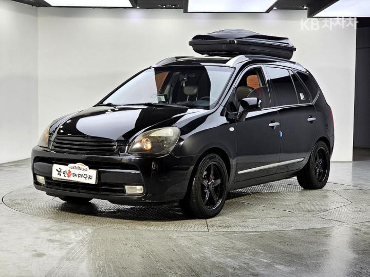 Kia Carens New 2.0 LPI GLX Top Model 2