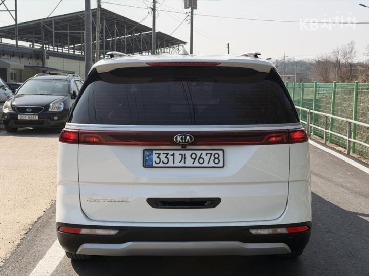 Kia Carnival D2.2 Prestige — фото 5