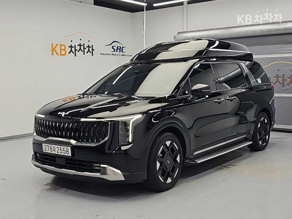 Kia Carnival SIGNATURE — фото 1