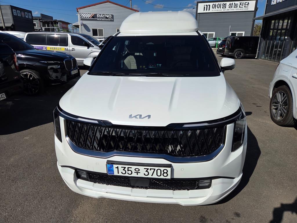 Kia Carnival SIGNATURE — фото 1