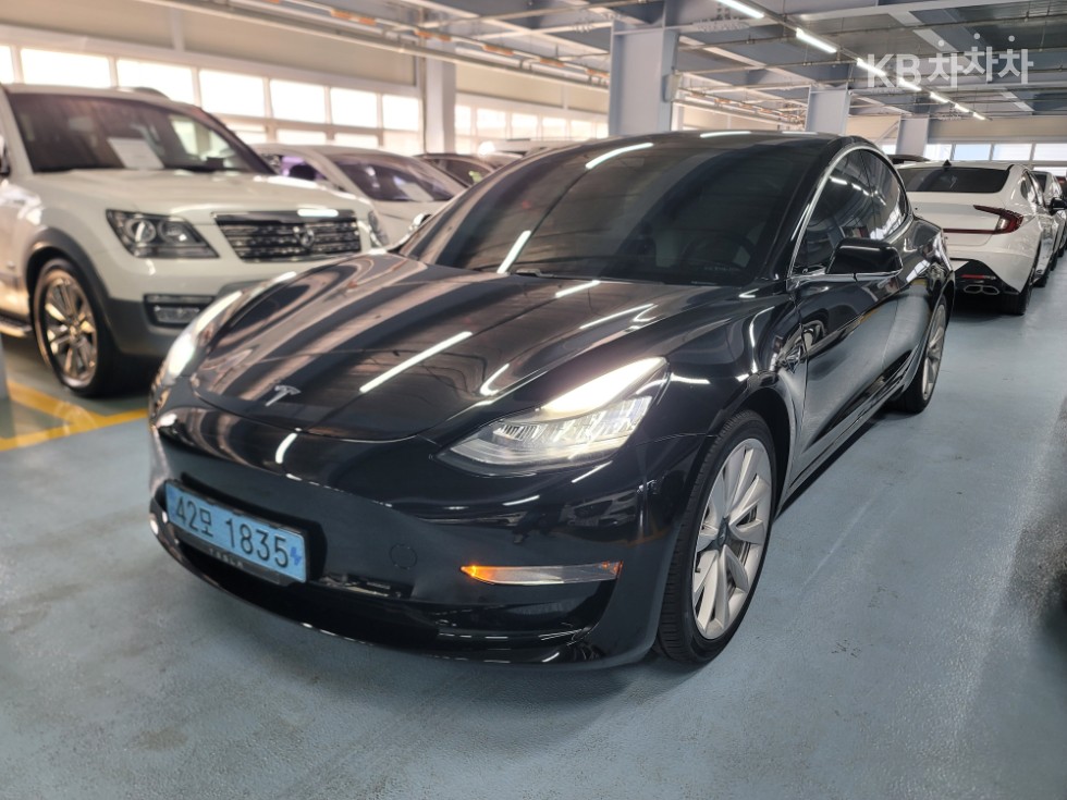 Tesla Model 3 Long Range - фото 1