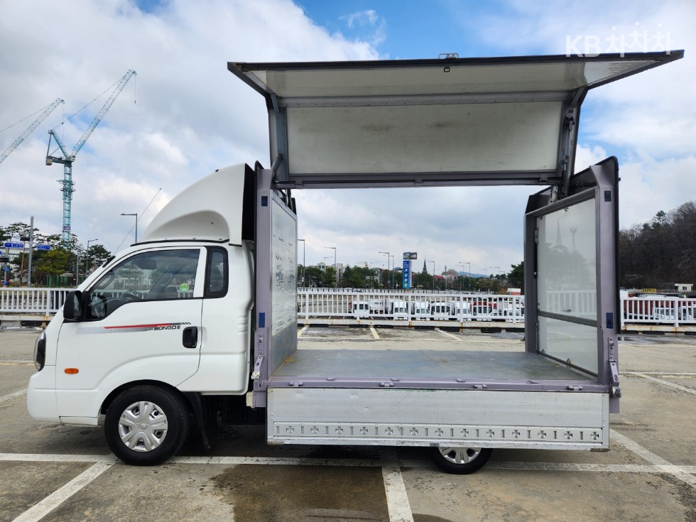 Kia 더 뉴 봉고3 윙바디 1톤 전동모터식 킹캡 초장축 GL - фото 1