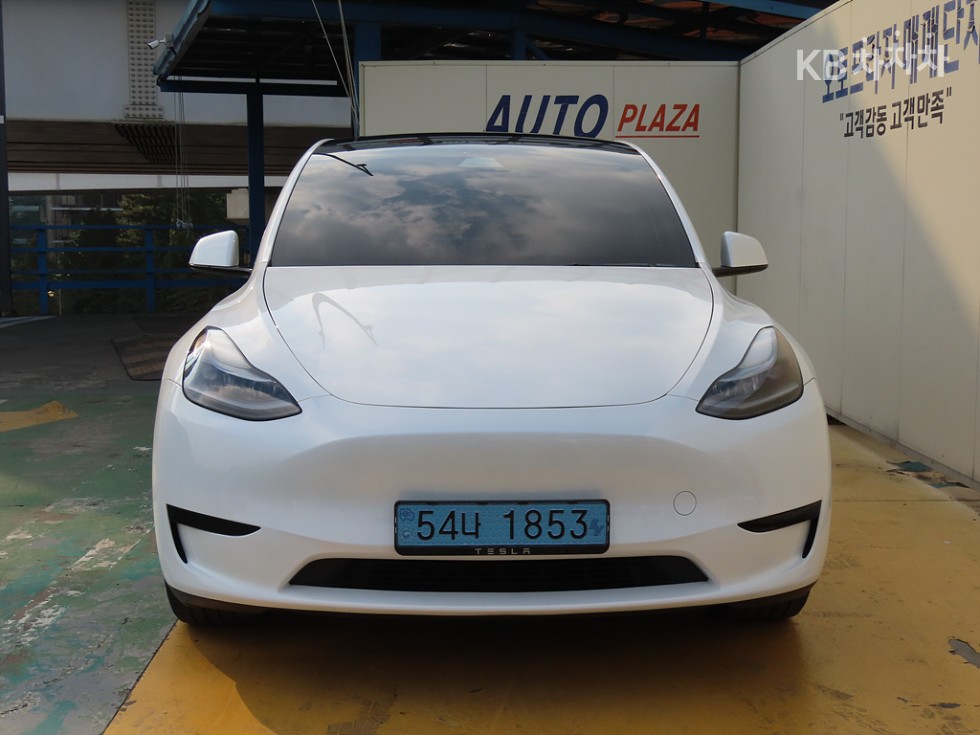 Tesla Model Y BASE MODEL — фото 2