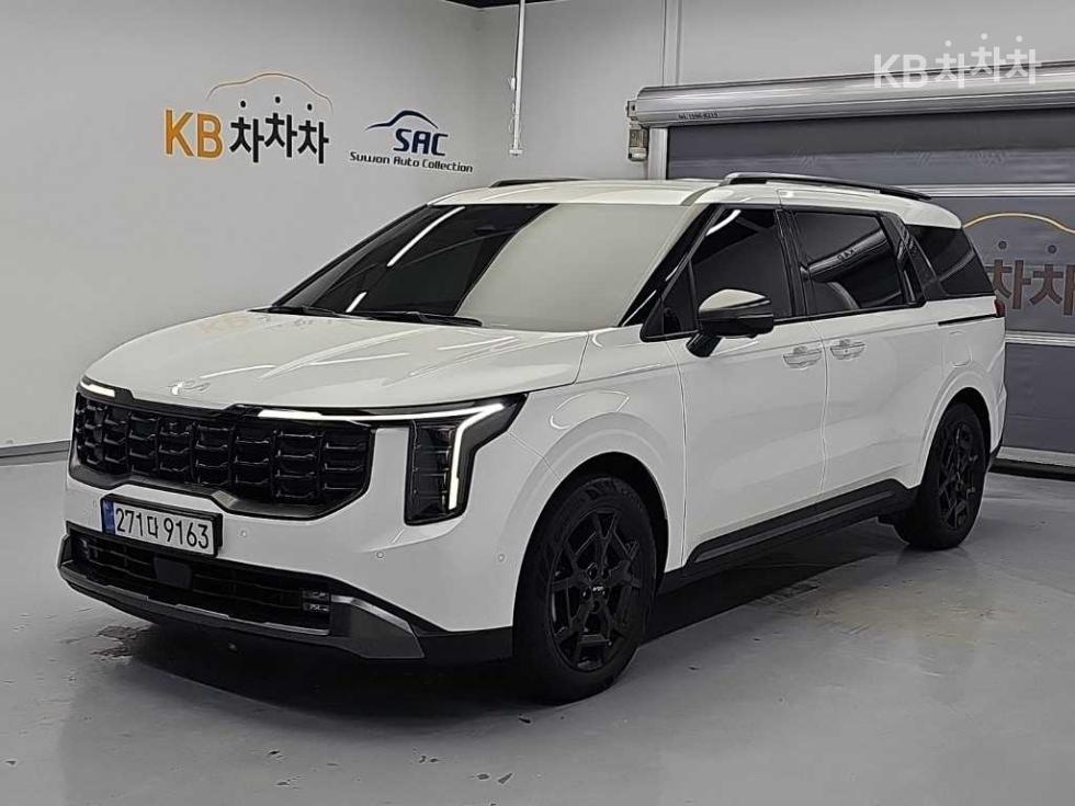 Kia Carnival SIGNATURE — фото 1