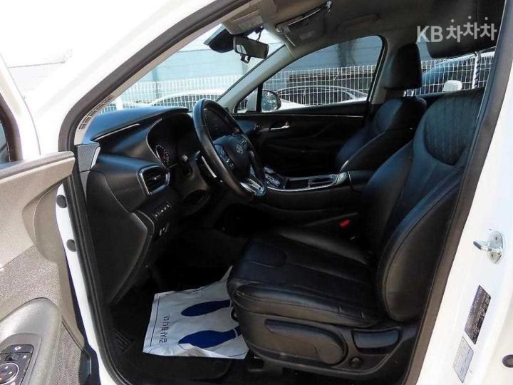 Hyundai Santa Fe TM Hybrid 1.6 HEV 4WD Exclusive 6