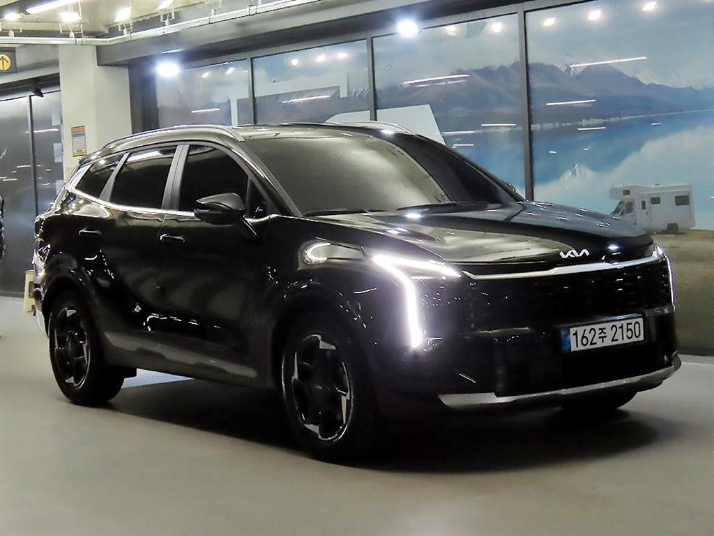 Kia Sportage Signature — фото 1
