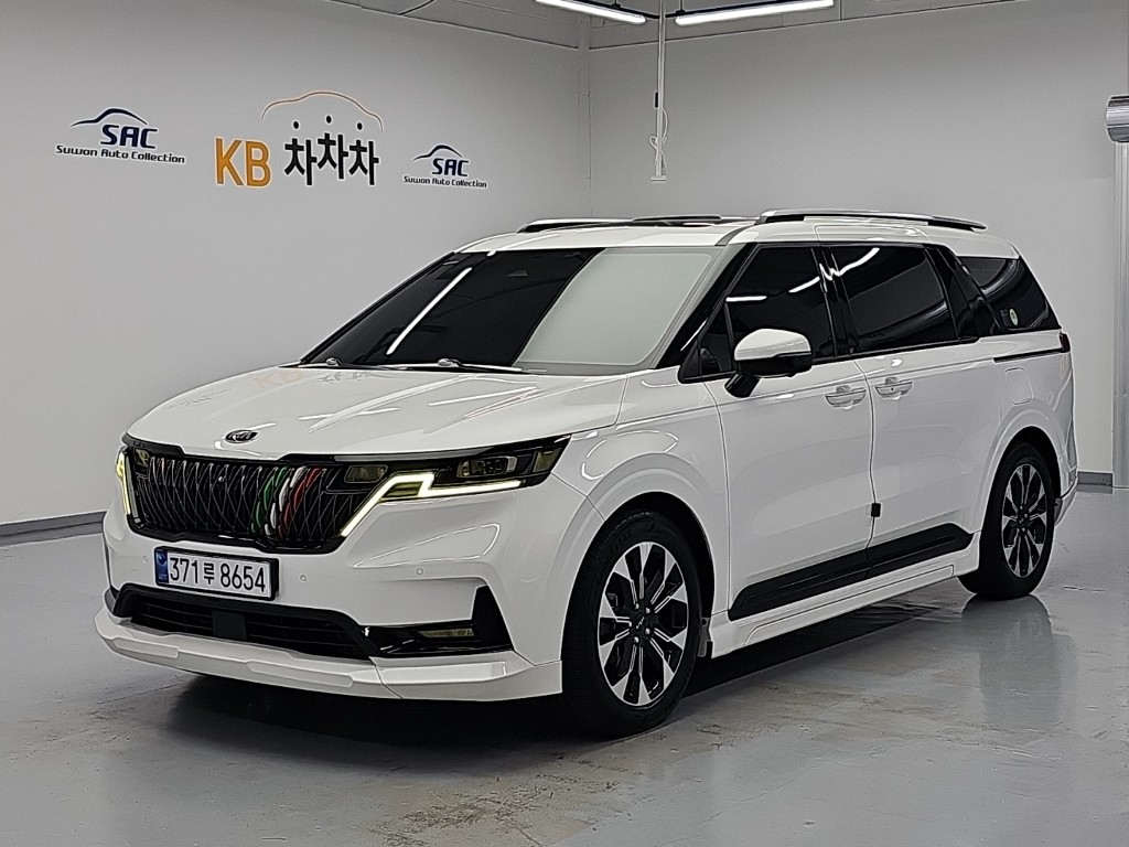 Kia Carnival SIGNATURE — фото 1